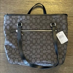 Brand new with tags Coach Purse. Black.